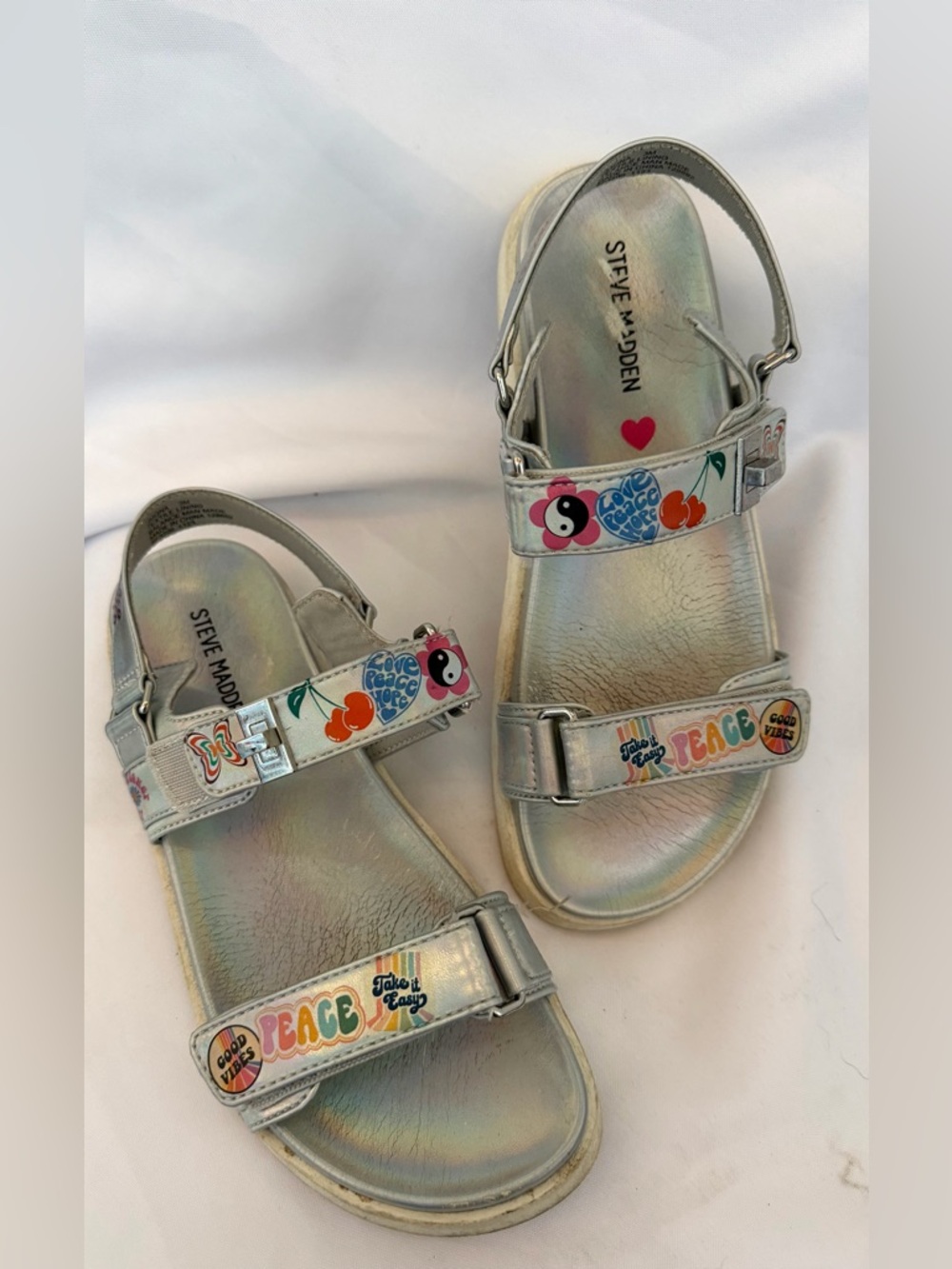 Steve Madden Kids Silver Holographic Peace Sticker Sandals